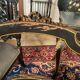 Set of four Napoleon III chairs in black lacquered wood with gold highlights.