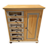 Grain merchant-style furniture with 6 drawers and a cupboard.