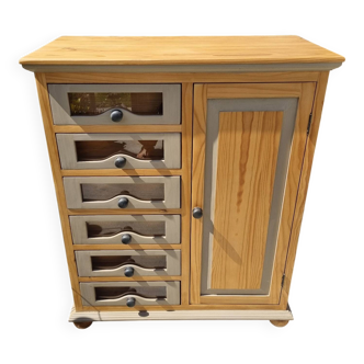 Grain merchant-style furniture with 6 drawers and a cupboard.