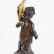 Antique candelabrum in bronze and black marble, Europe, 19th century.