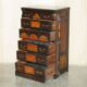 Victorian Wellington chest in figured elm by R Crosby & Son with 160 seal impressions.