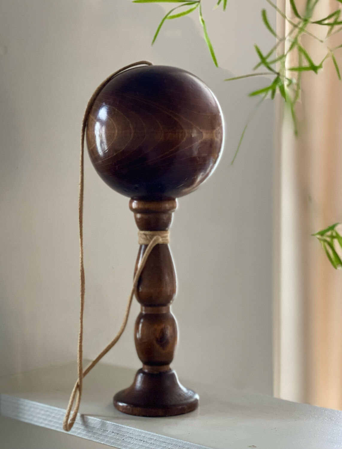 Old bilboquet in turned wood