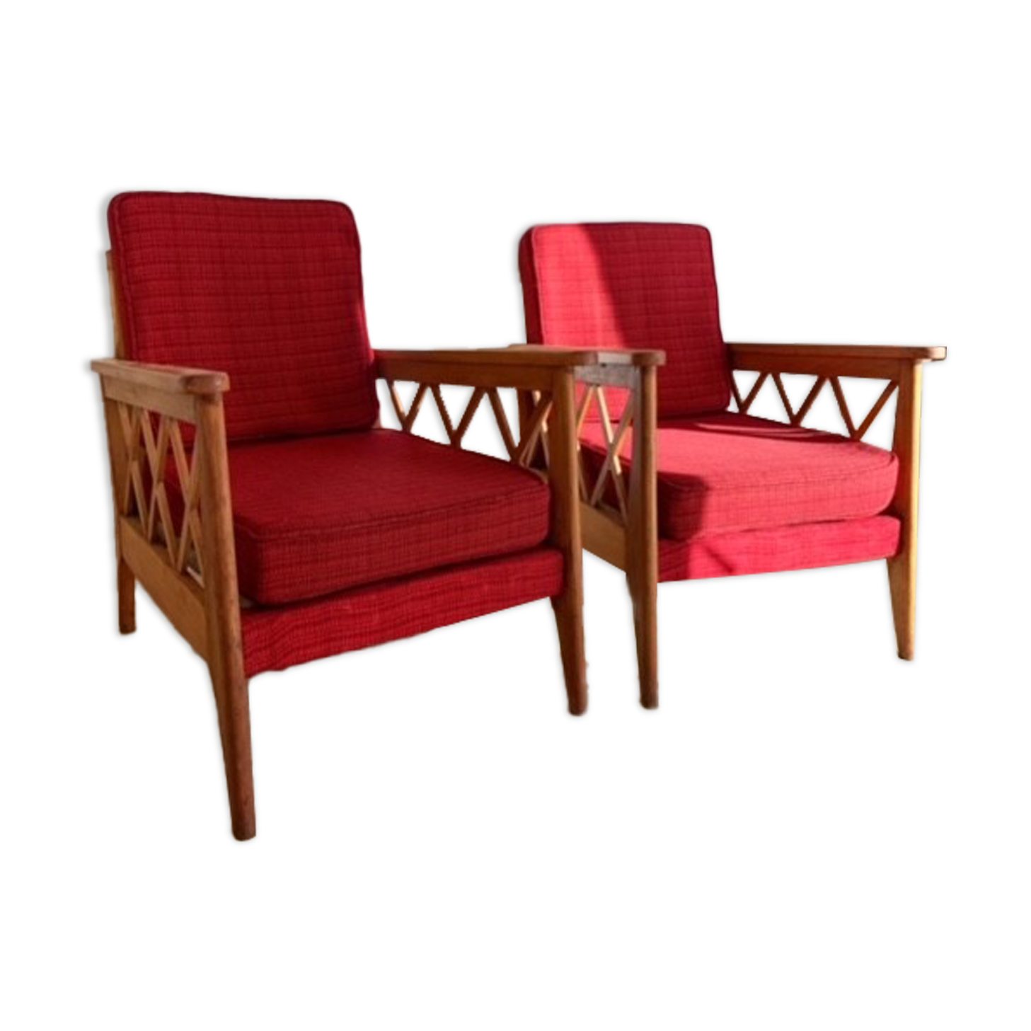 Pair of vintage wooden armchairs with braces