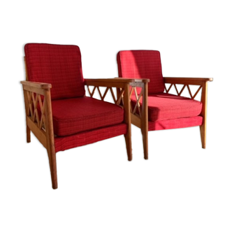 Pair of vintage wooden armchairs with braces