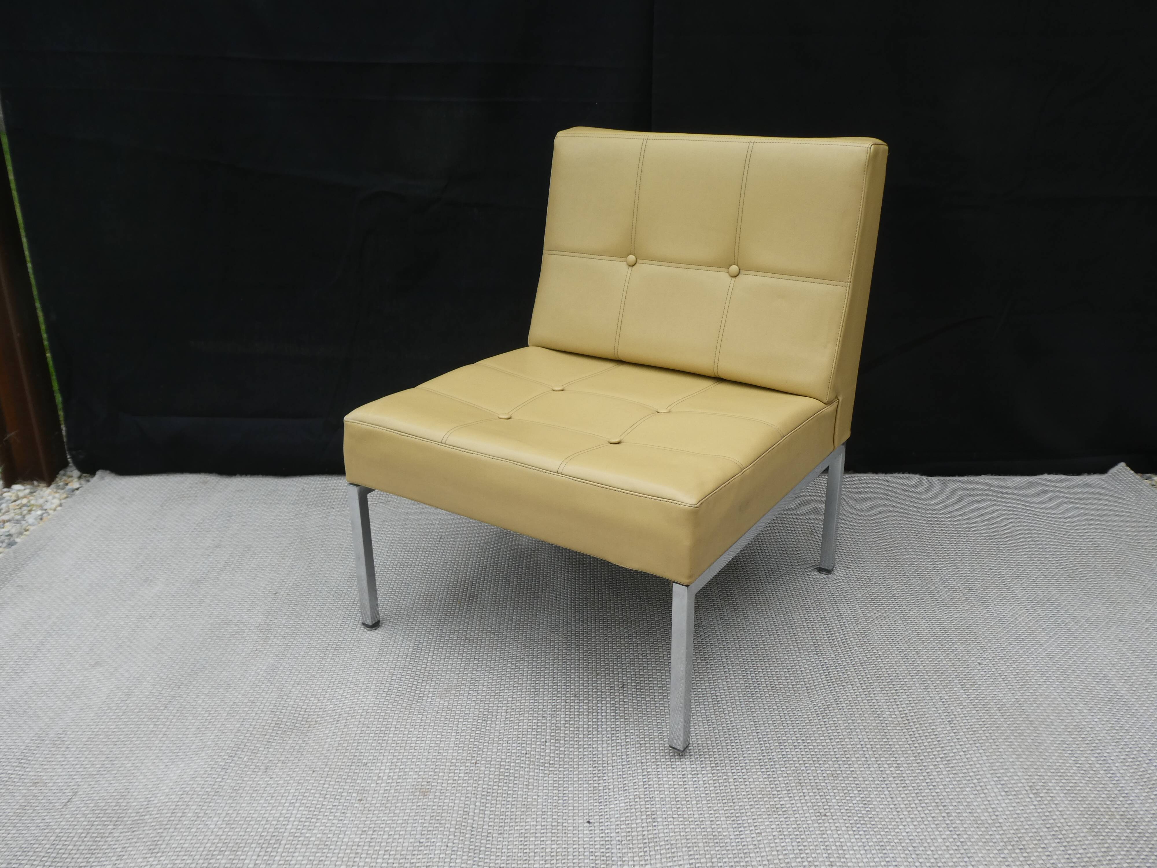 Low chair in Skai and chrome, Mobilier International