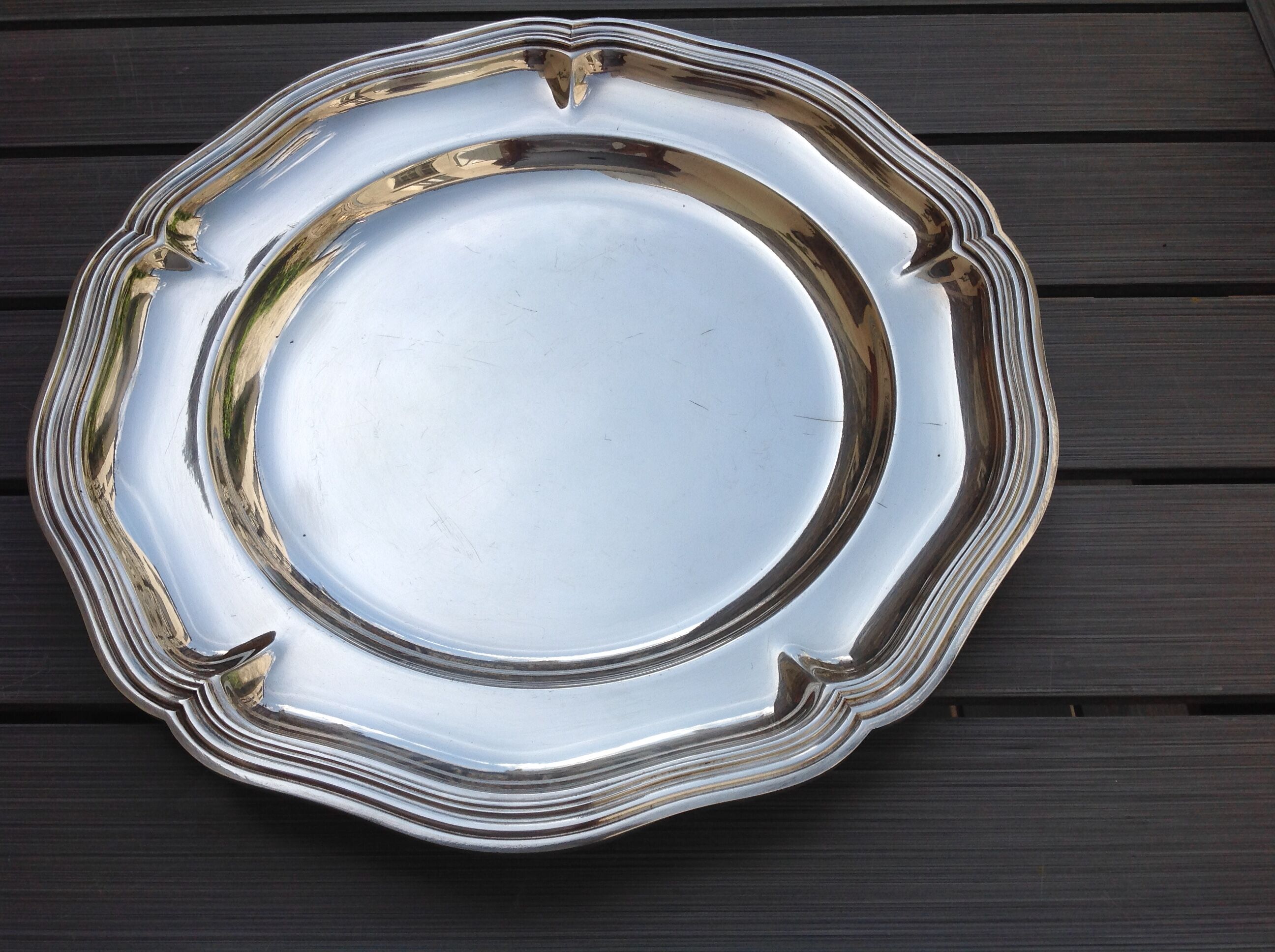 Silver metal dish with twisted edges