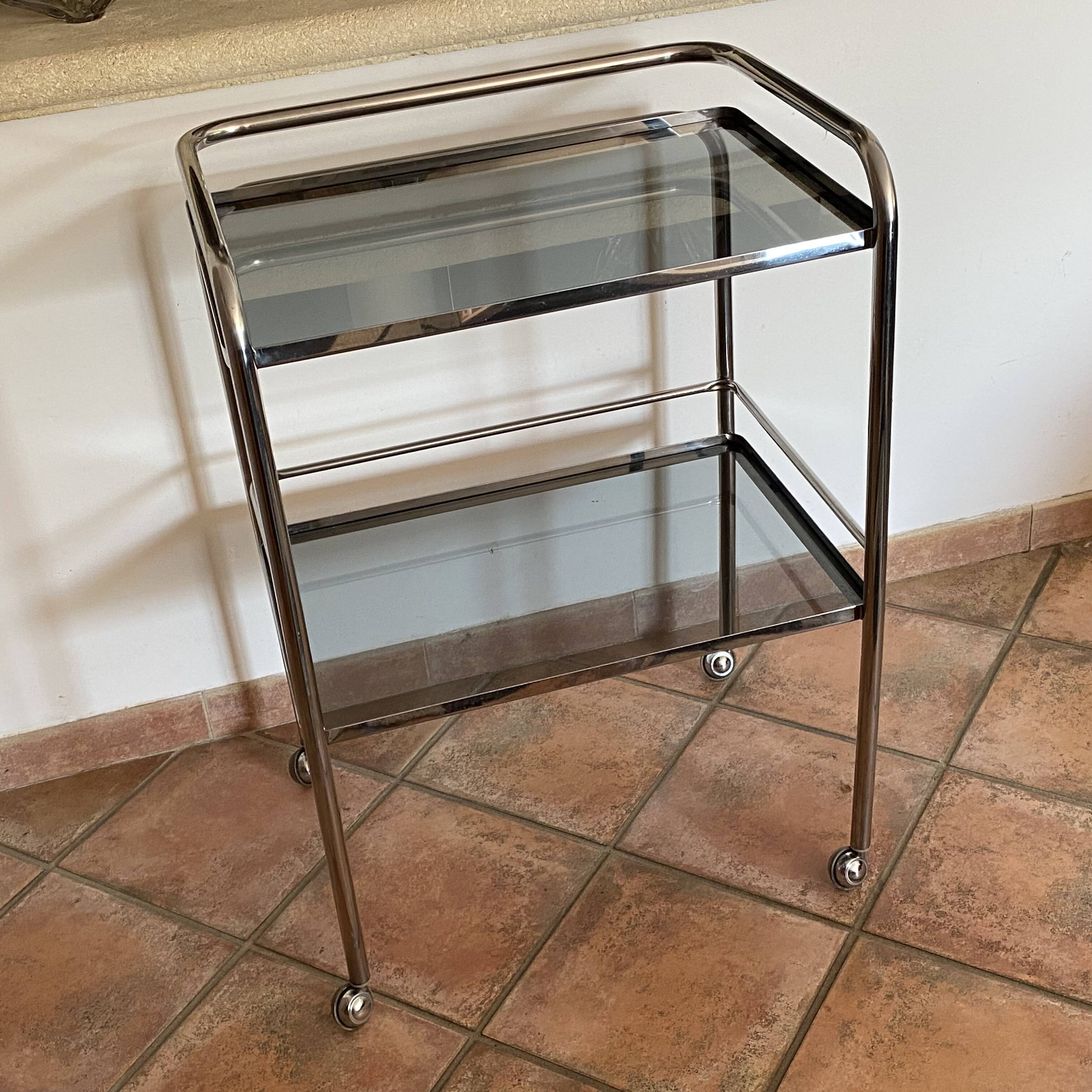 Trolley on wheels in chromed metal and smoked glass, 1970