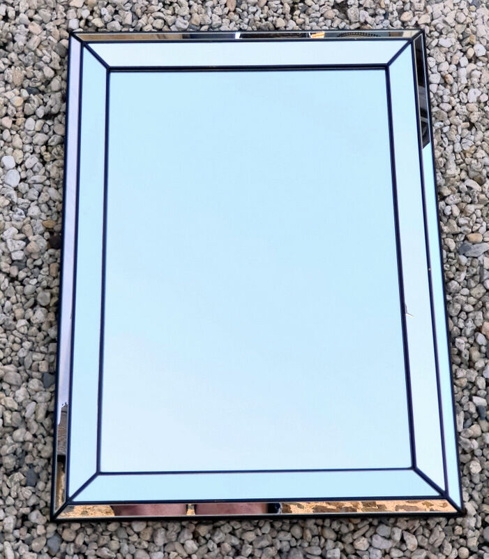 Vintage mirror deknudt with 70's parecloses