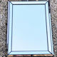 Vintage mirror deknudt with 70's parecloses