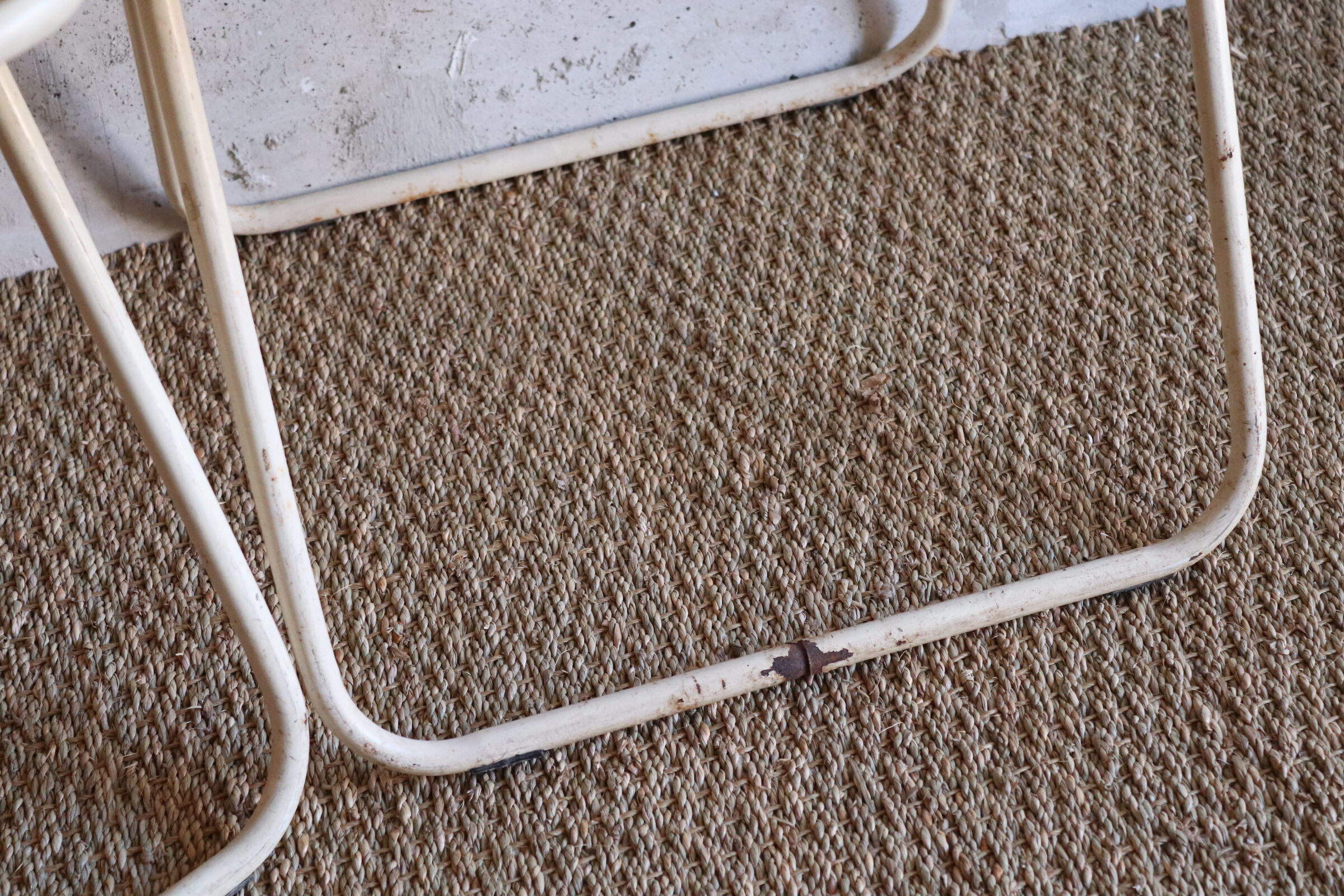 Two metal tanned folding chairs