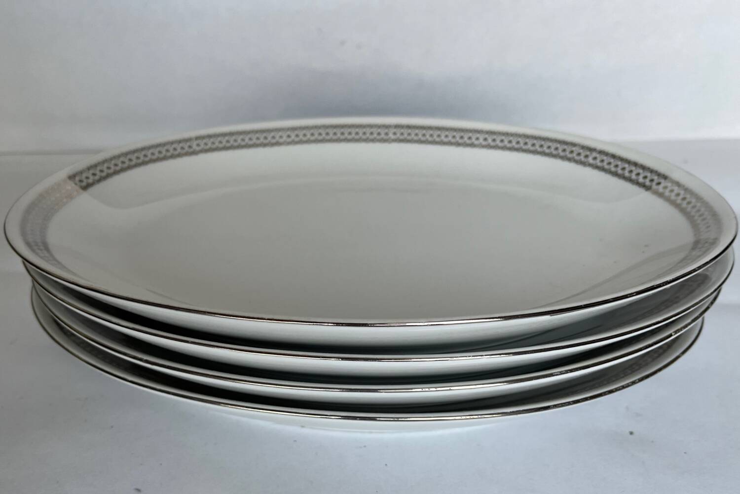 4 oval white porcelain dishes