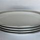 4 oval white porcelain dishes