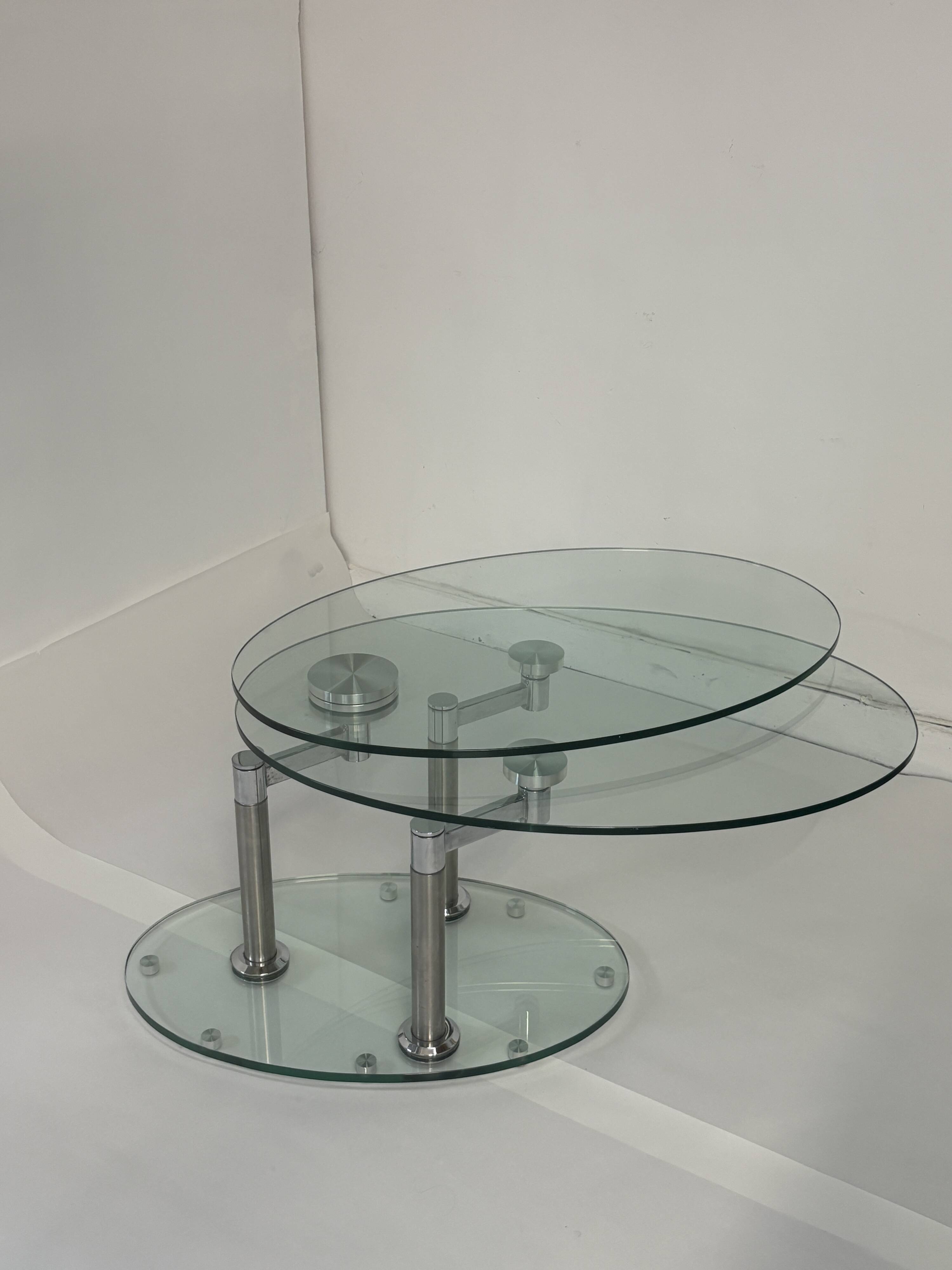 Oval designer coffee table in tempered glass