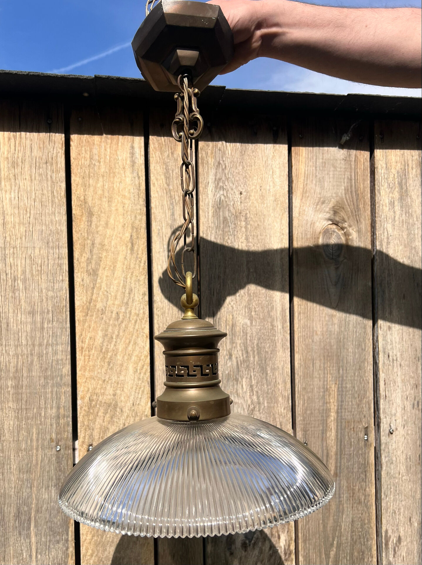 Art Deco suspension from the 1930s in glass and brass.