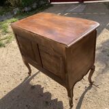 Commode sauteuse en noyer