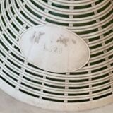 Large green glass lady-Jeanne in a khaki plastic basket, mid-century style.