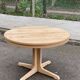 Scandinavian Baumann round extendable dining table with central leg, 115cm.