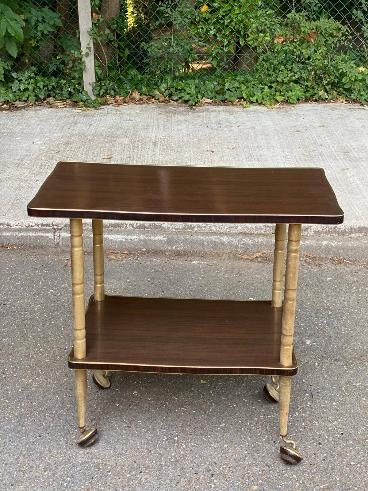 Double-tray rosewood serving trolley on gilded casters, 1970