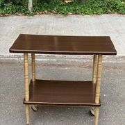 Double-tray rosewood serving trolley on gilded casters, 1970