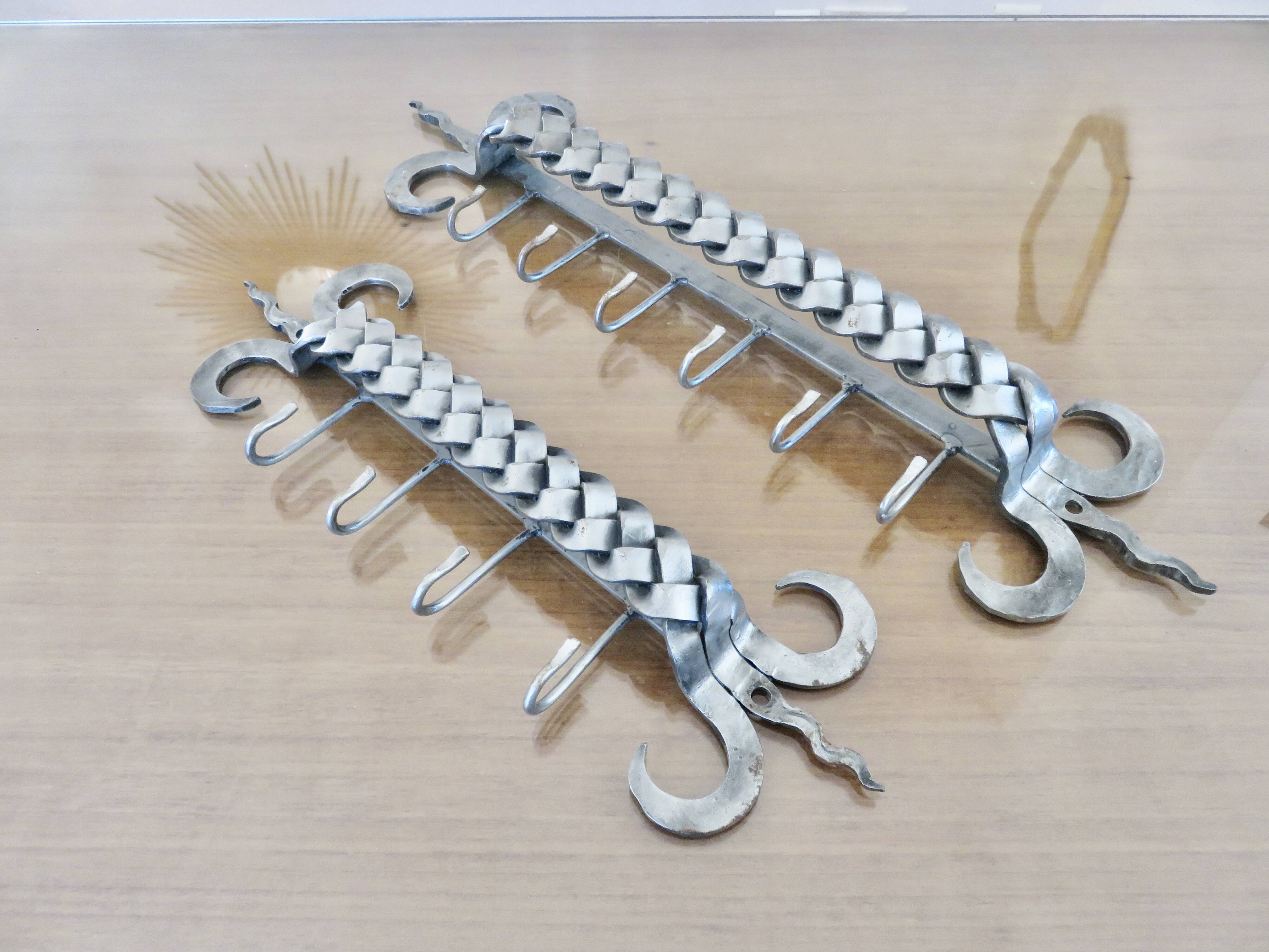 2 Tea towel holders, ironwork in braided raw steel, 1970