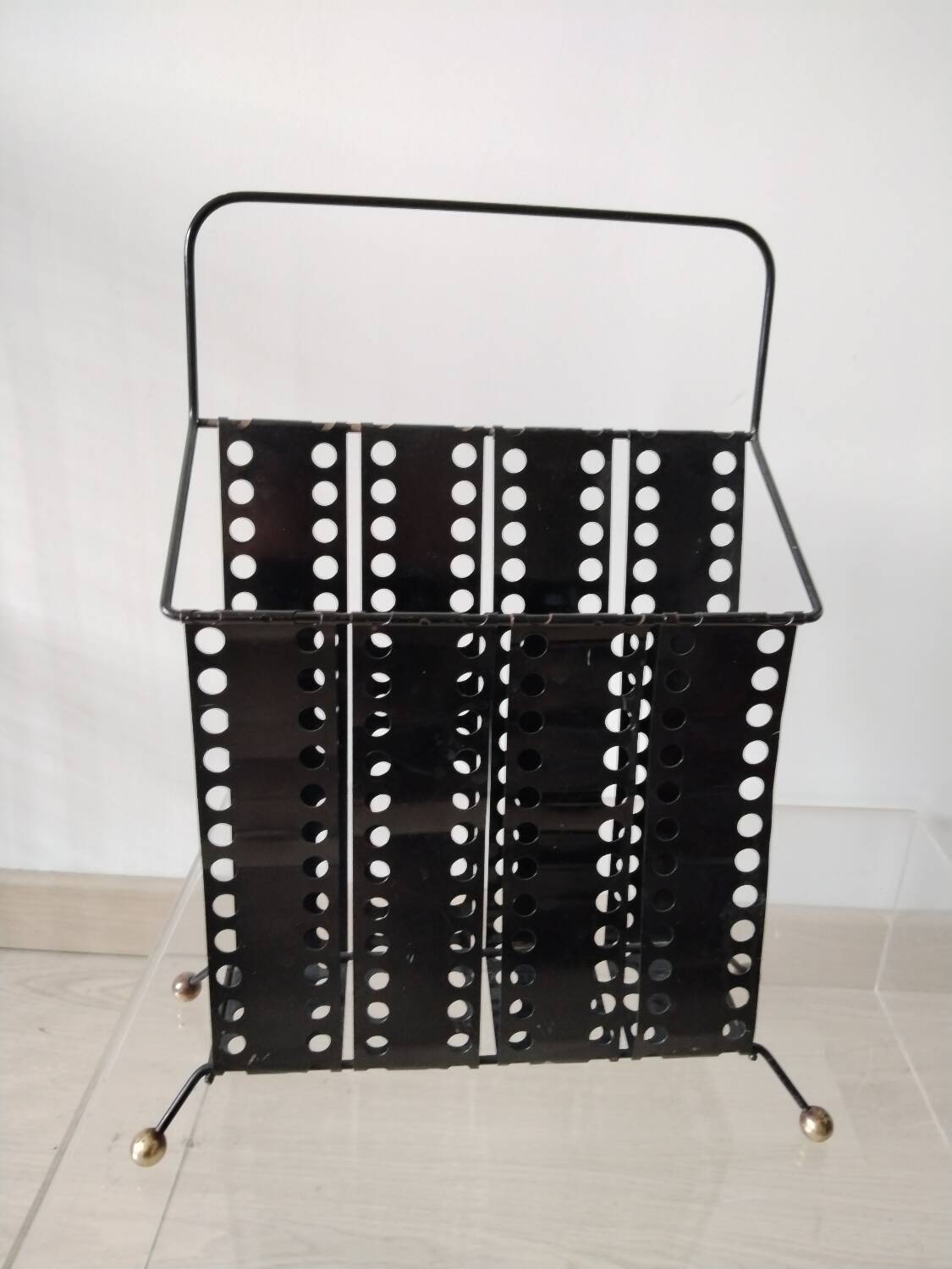 “Santiago” magazine rack in perforated sheet metal Mathieu Mategot 1950s