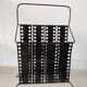 “Santiago” magazine rack in perforated sheet metal Mathieu Mategot 1950s