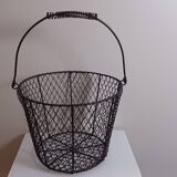 Round black metal mesh basket