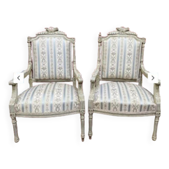 Pair of Louis XVI convertible armchairs