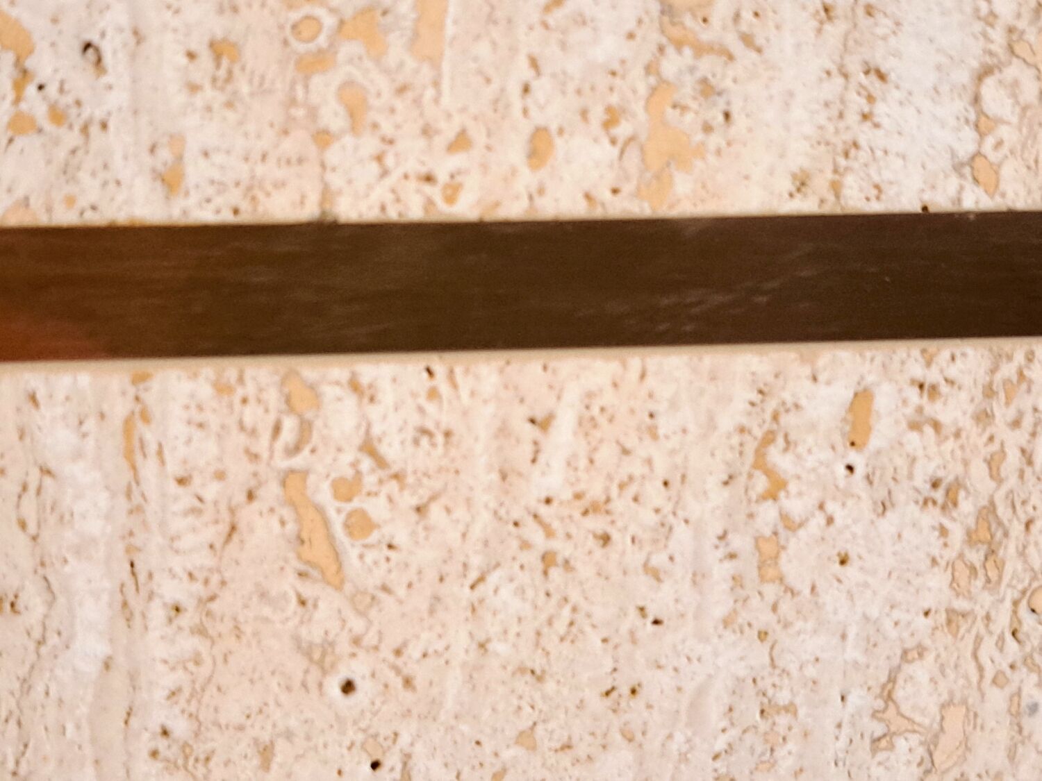 Travertine and brass coffee table