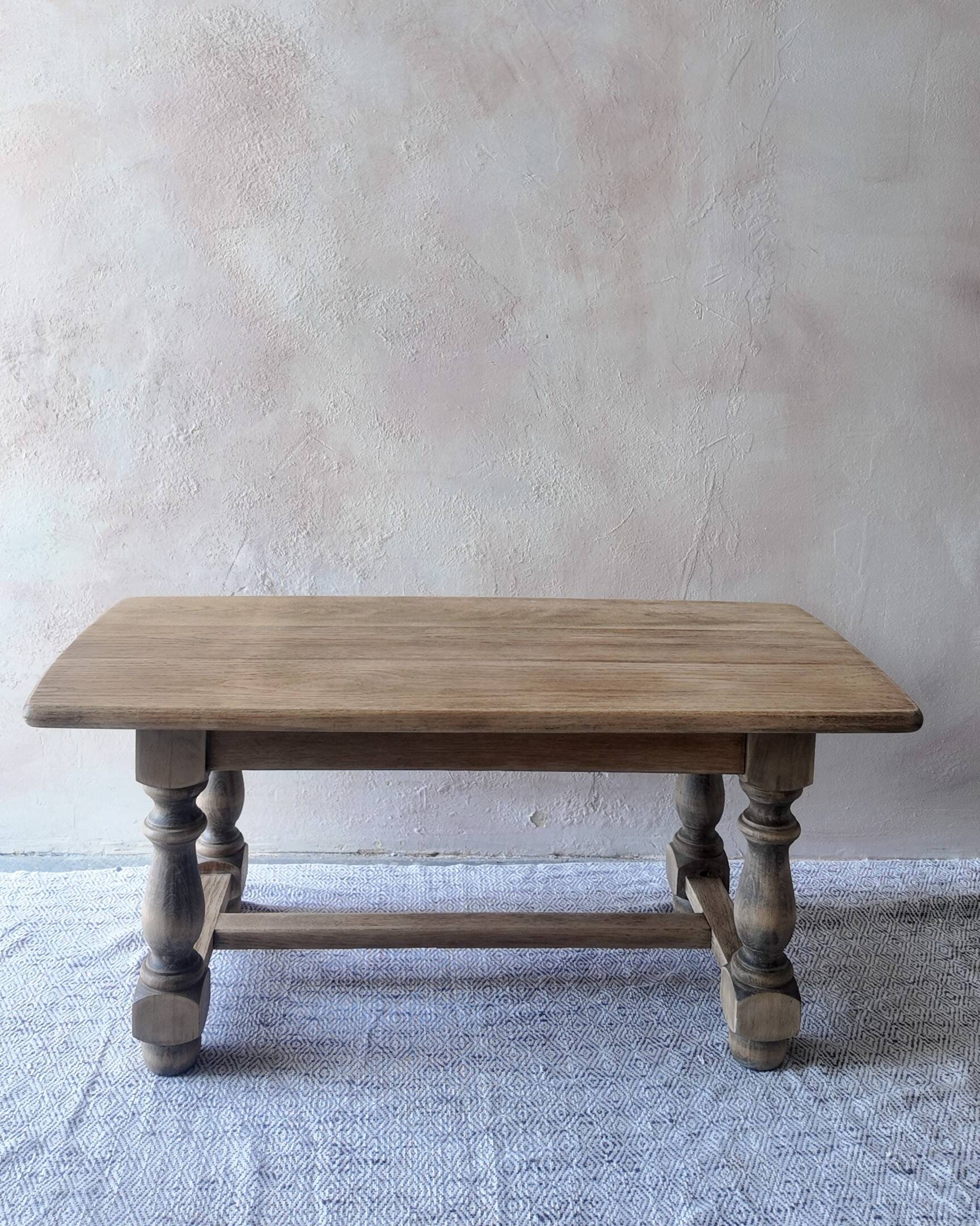 Old farmhouse coffee table in solid oak - turned legs and stretcher.
