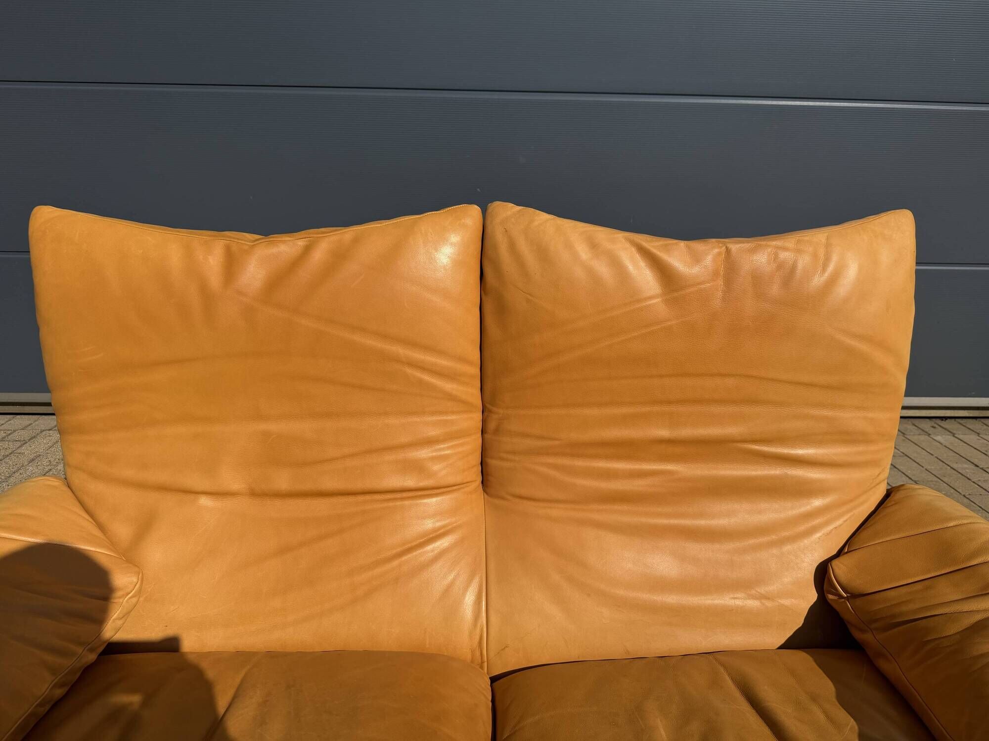 Beautiful Cassina Maralunga 2-seater in camel light patinated natural leather.