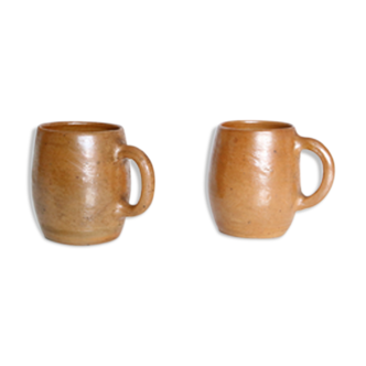 Duo of sandstone mugs