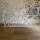 Small renovated wrought iron bed