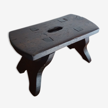 Old brutalist wood farm stool