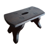 Old brutalist wood farm stool