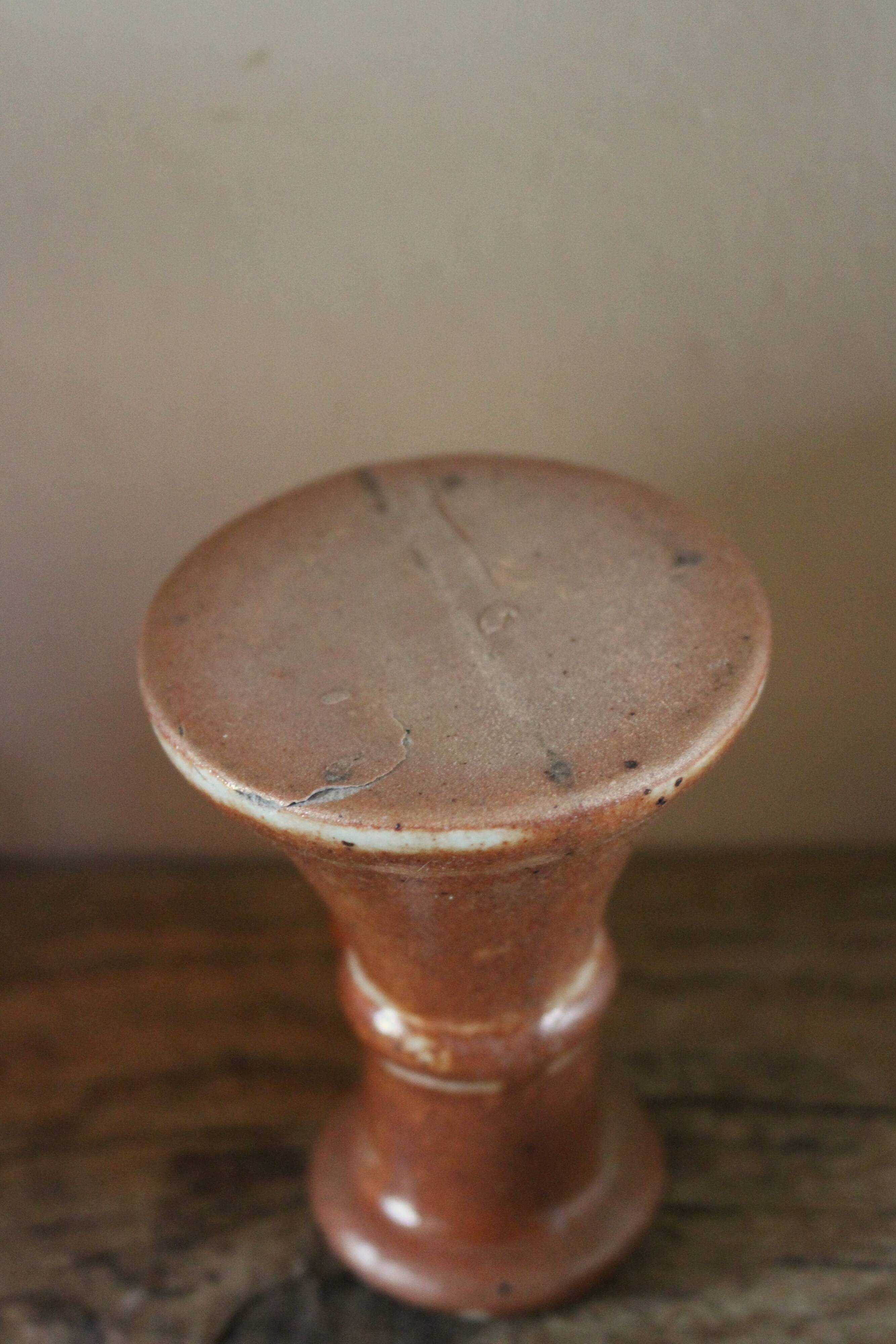 Small vintage marbled stoneware candlestick with handle