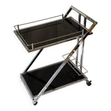 Modernist serving trolley in chromed metal and black smoked glass