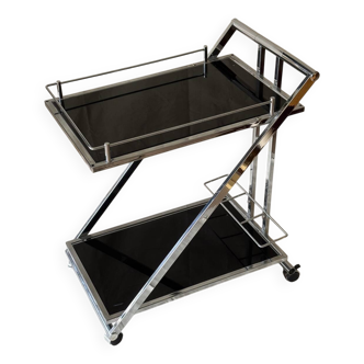 Modernist serving trolley in chromed metal and black smoked glass