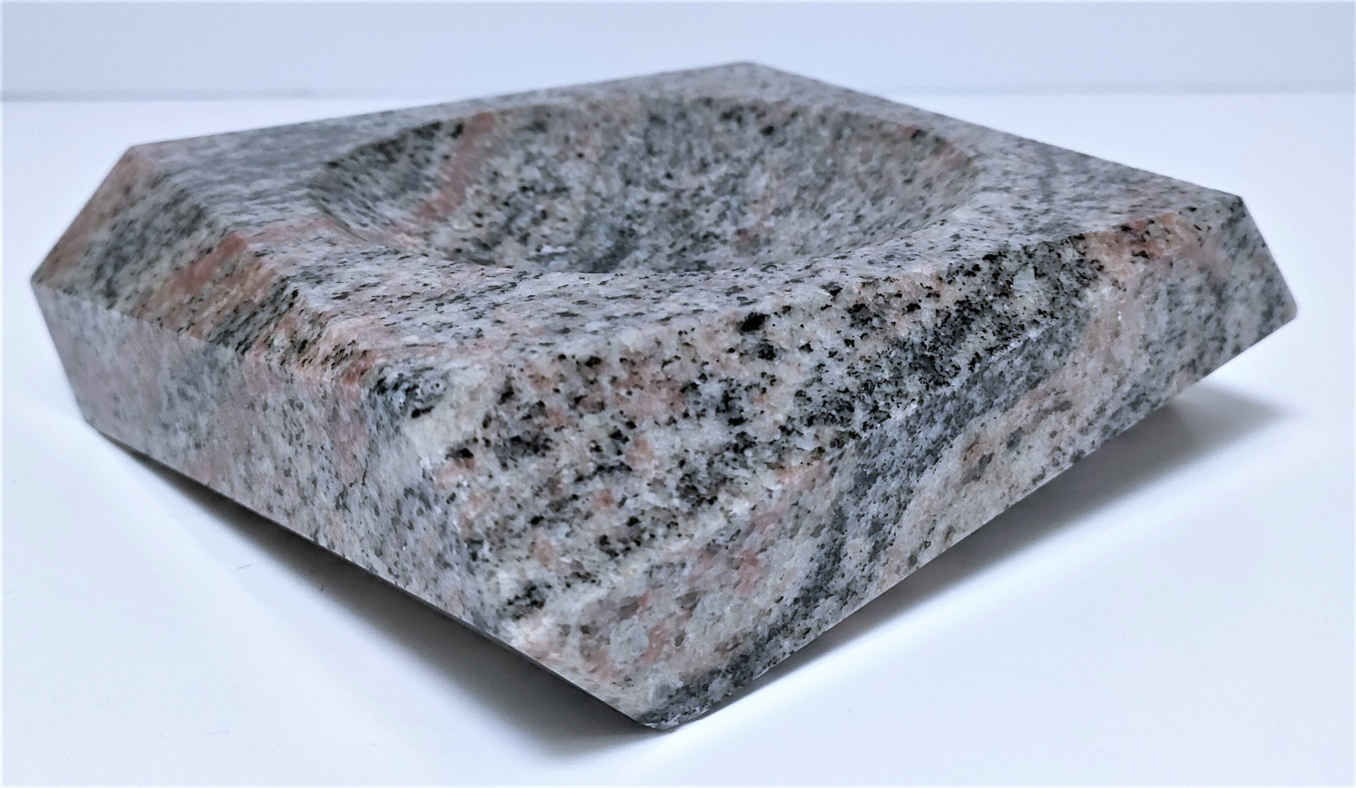 Pink granite pocket emptier from the 80s