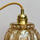 Vintage amber glass globe hand lamp