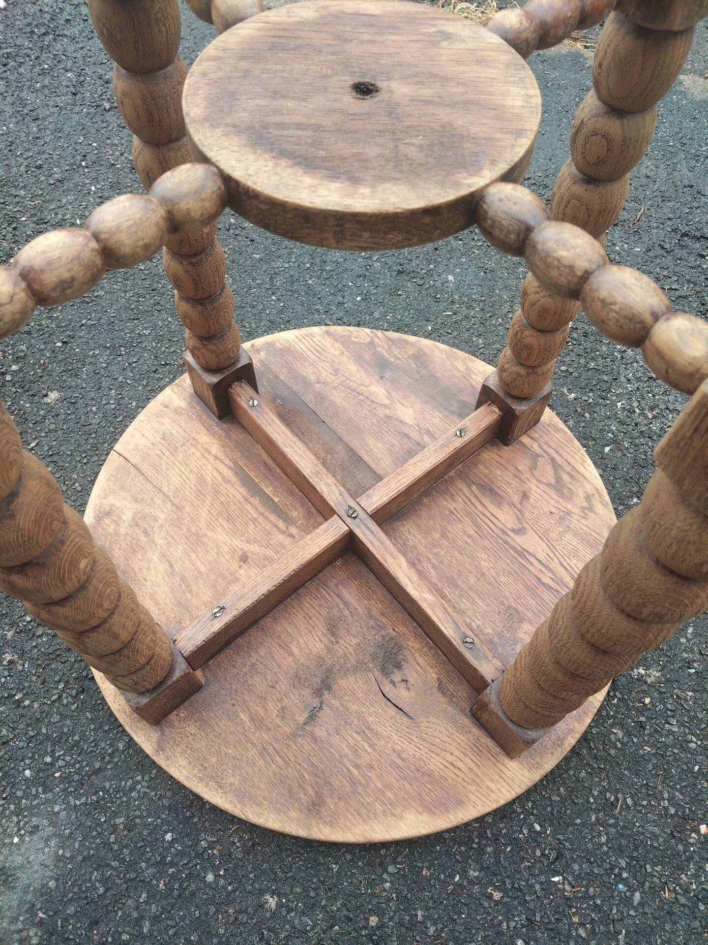 Oak gueridon in the style of Charles Dudouyt, 1940-50.