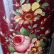 Antique metal umbrella stand with hand-painted floral decor, bohemian countryside