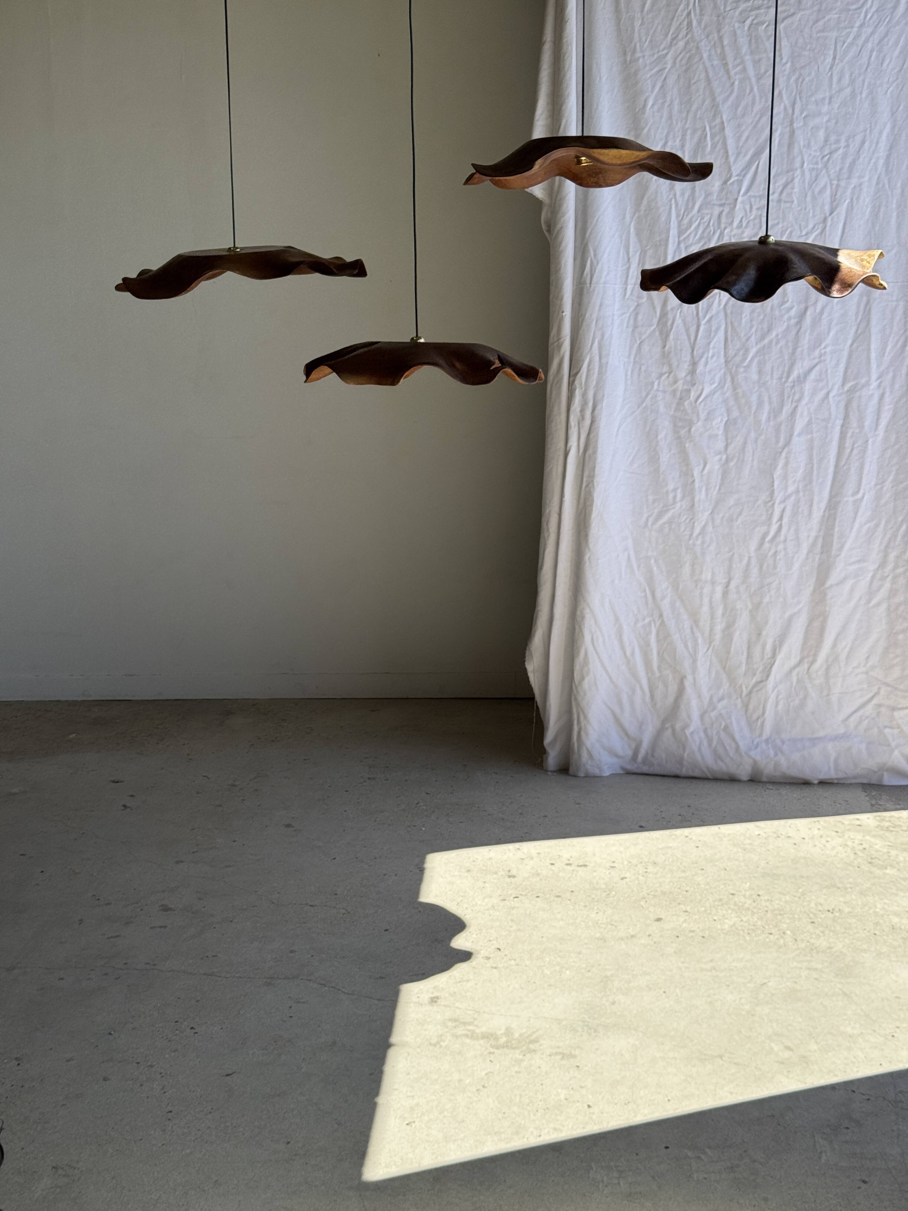 Very large wavy flat leaf suspension in smooth teak D:60
