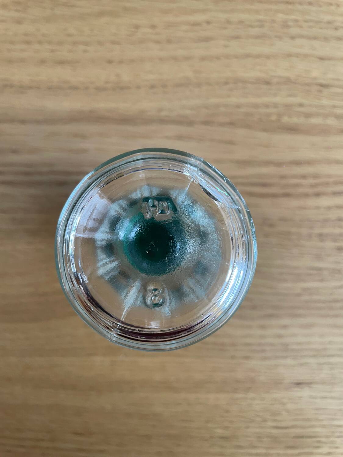Vintage salt shaker with green Bakelite cap