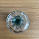 Vintage salt shaker with green Bakelite cap