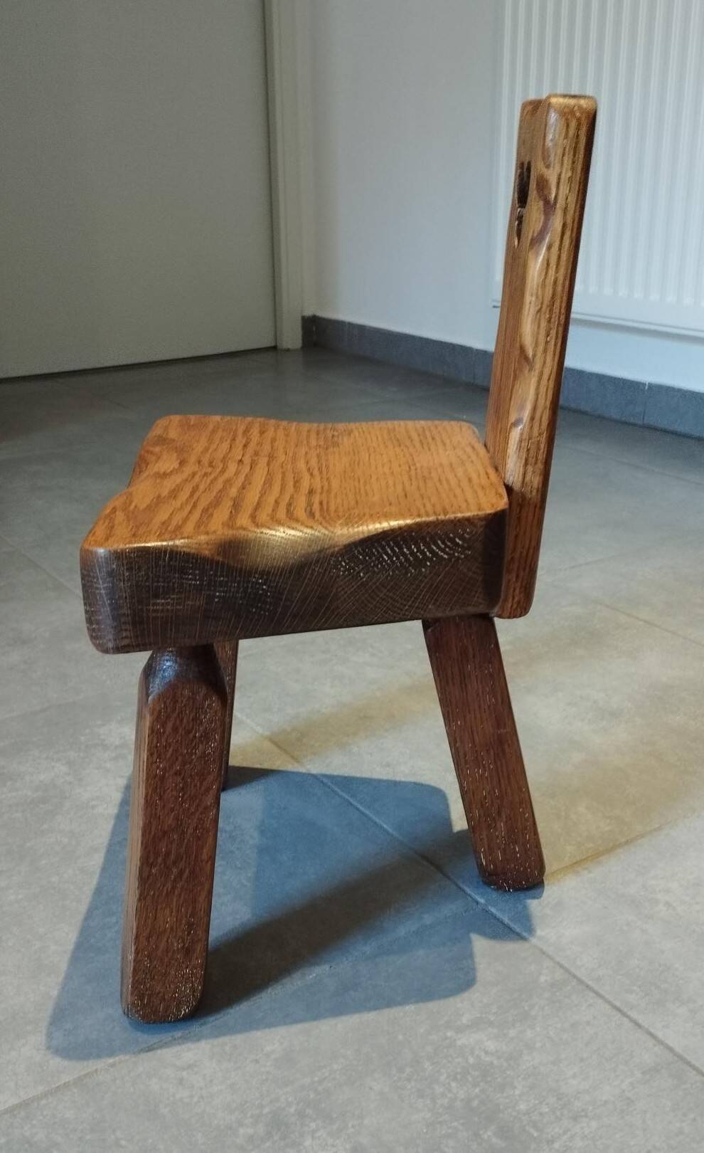 Tripod chair for children, Scandinavian brutalist chalet design.