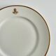 Service d’assiettes à bord doré, monogrammées | E. Bourgeois | Fin XIX
