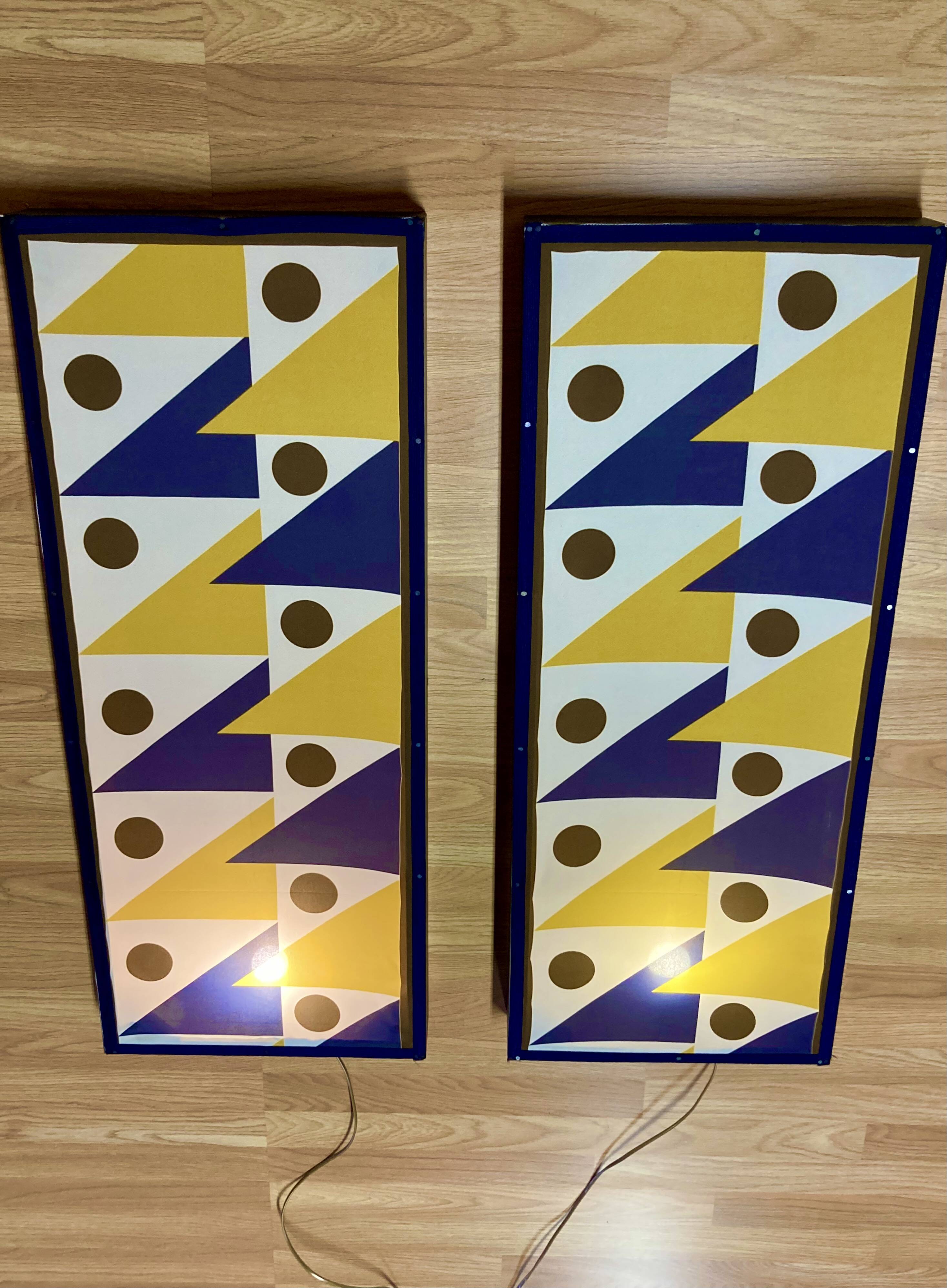 Pair of large "Scandinavian design" wall lights.