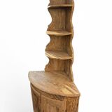 19th-century patinated pine corner buffet from England with shelves.