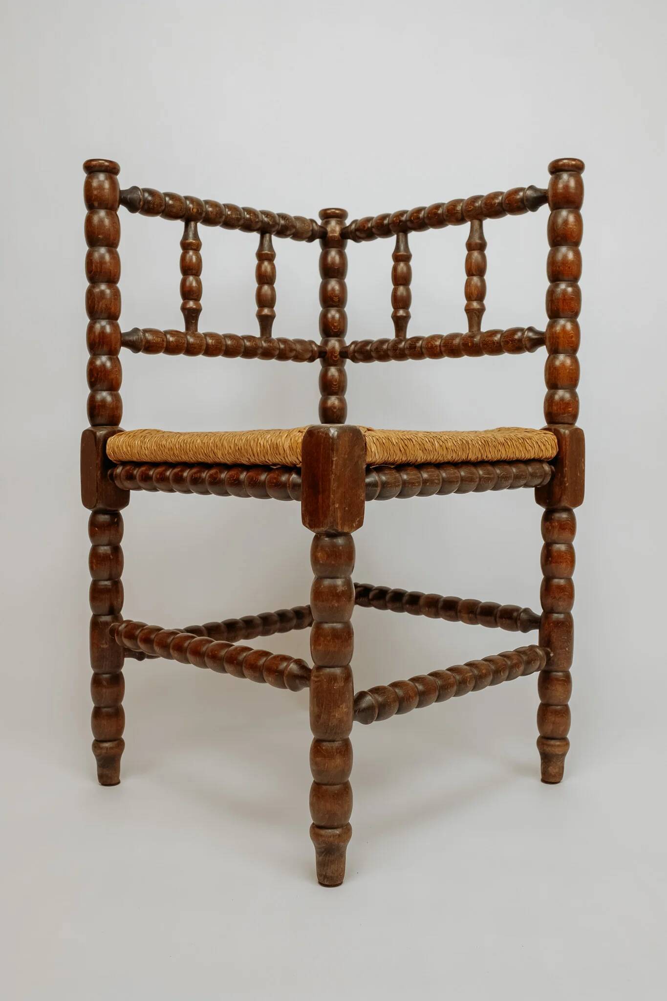 Classic vintage bobbin corner armchair